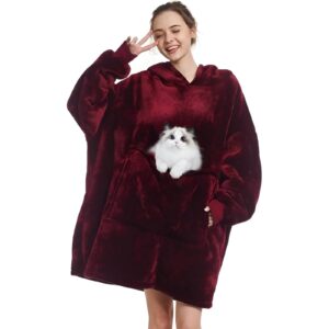 A cozy oversized hoodie blanket, perfect for staying warm and comfortable while relaxing.