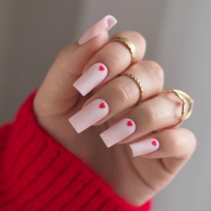 Beautiful heartfelt nails with small red heart in the middle of each nail