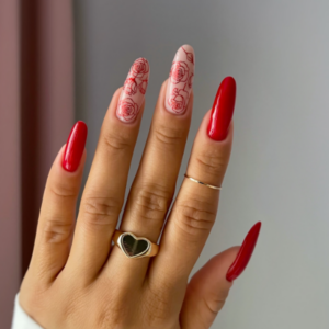 Close-up of beautifully designed Valentine’s Day nails featuring red roses 