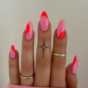 Close-up of beautifully designed Valentine’s Day nails featuring mix of pink and fluo orange design