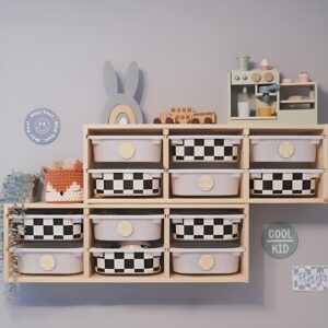 A kids' playroom featuring cube storage shelves filled with colorful bins, toys, and books neatly organized for easy access.