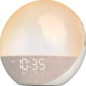 Hatch Restore sound machine for a calming bedtime reading atmosphere.