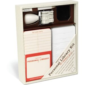 Personal library kit with checkout cards and stamps for book lending.