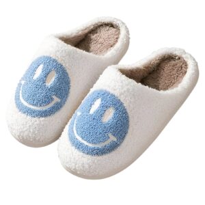 A pair of fluffy smiley face slippers bringing comfort and joy. Great Housewarming gift