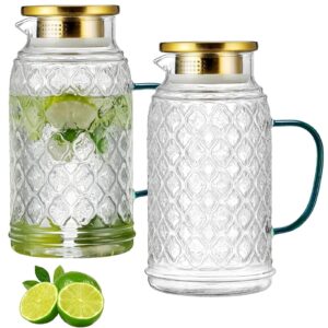 A glass carafe with matching tumblers elegantly arranged on a dining table. Great Housewarming gift