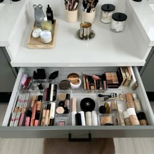 Transparent makeup drawer dividers to keep cosmetics organized and easy to find.