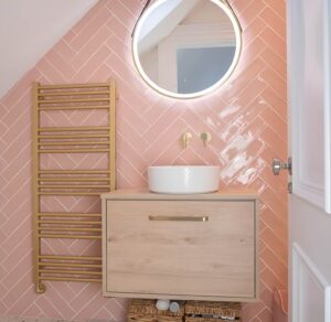 A modern floating vanity creating the illusion of more floor space in a small bathroom.