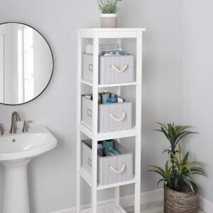 Foldable storage bins neatly organizing toiletries and towels while being easy to store when not in use.