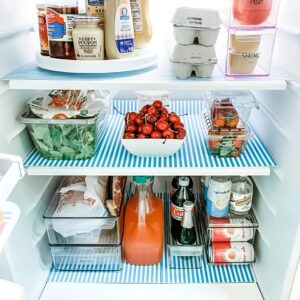 Fridge liners placed on shelves for quick and easy cleanup of spills.