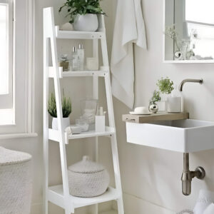 A stylish ladder shelf providing extra storage for towels and toiletries in a small bathroom.