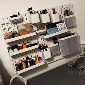 Wall-mounted pegboard beauty station for customizable and efficient makeup storage.