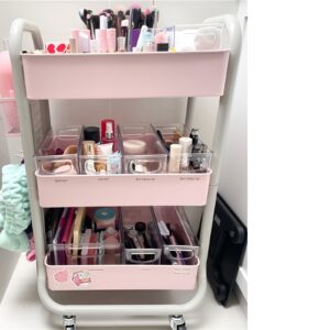 Mobile makeup storage cart with multiple tiers, perfect for organizing beauty products and tools.