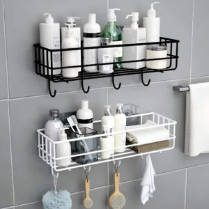 Stick-on shower caddies attached to the wall for convenient storage of shampoos and soaps.